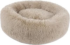 Cómo entrenar a tu gato para que use una cama tipo nido o donut